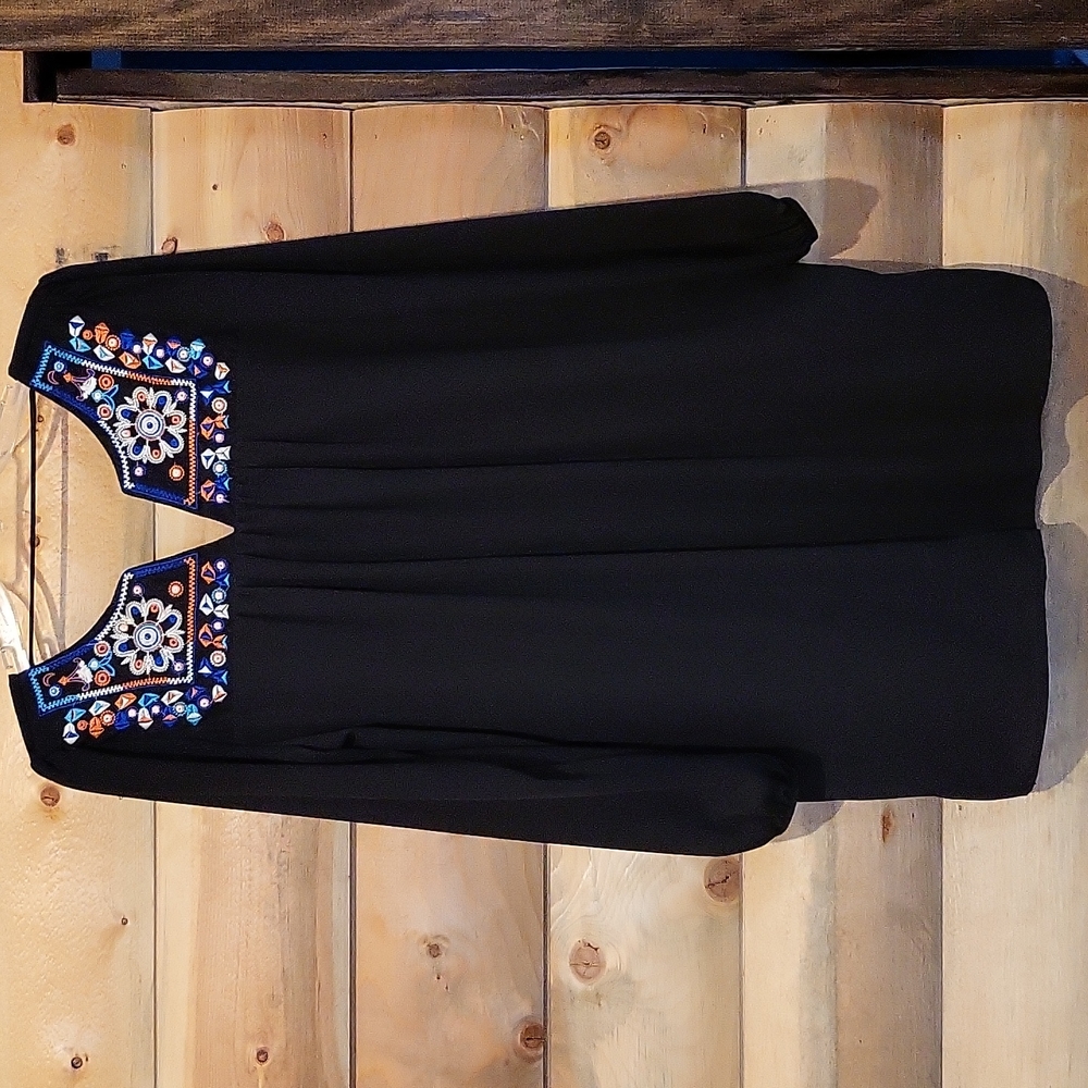 Beautiful Black Mini Dress with Emboidered Top and Low Back